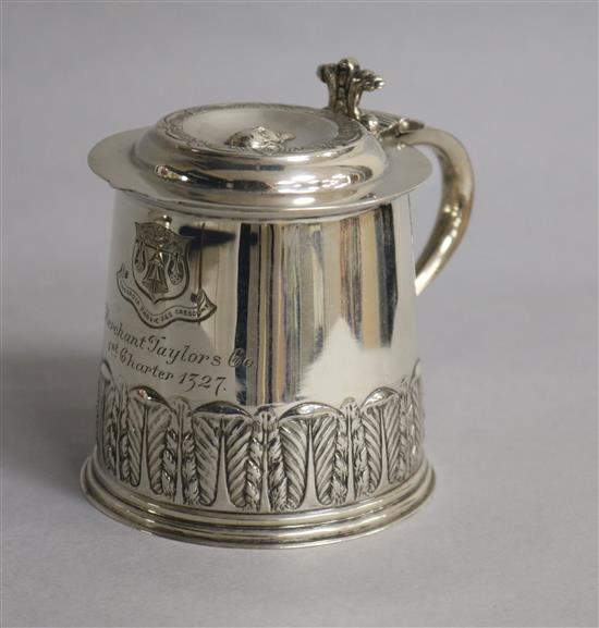 A 1920s miniature silver tankard engraved with the arms of Merchant Taylors Co, London, 1926, 6.5 oz.